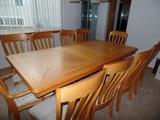 Kitchen/Dining room table w/1 leaf and 10 chairs