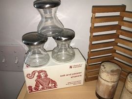 We love these funky mid century salt and pepper shakers. One pair is still in its original box.