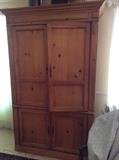 Farmhouse wood storage armoire