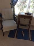 Slipcovered side chair, antique side table