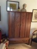 Mid century armoire with carved vine motif