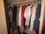 Closet full of clothes, small sizes