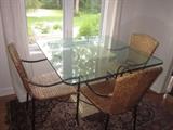Glass Kitchen table and wicker chairs