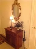 lovely entry table/cabinet, gilt mirror and decor