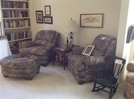 another shot of the library. The chairs are La-Z-Boy partial recliners with a matching ottoman in a duck hunting print, we have a nice selection of books and artwork