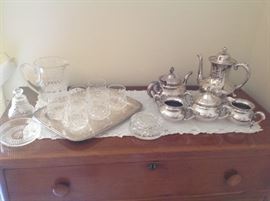 some of the Waterford and a silverplate tea service
