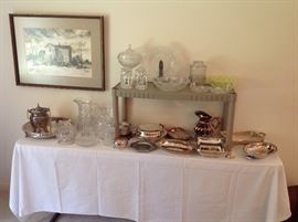 some of the silver and glassware. We have old pattern glass and Waterford and both siverplate and sterling items