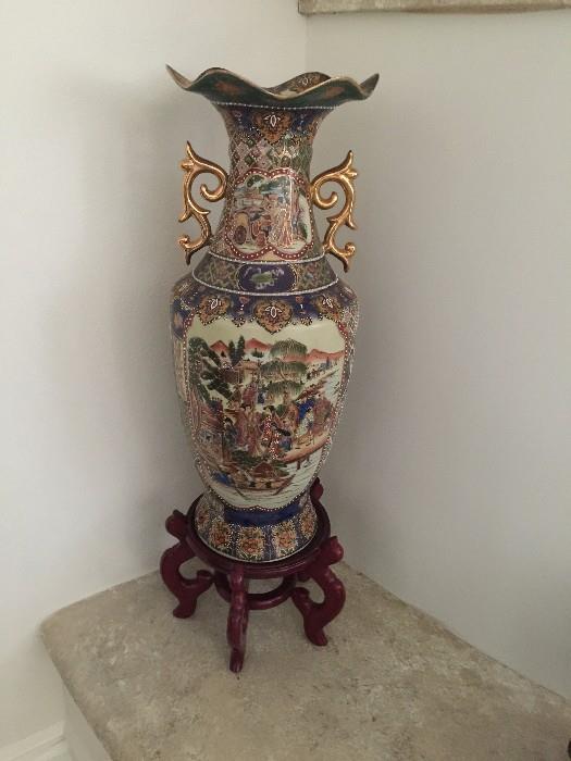 large oriental vase with stand.  two available. 