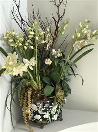 Beautiful orchid with succulents.  Very large comes in gorgeous vase.  Change the look of any room