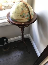 Bombay company beautiful world globe on and nice dark cherry wood stand.  know your geography.