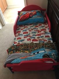 Toddler bed with mattress and bedding. Like new