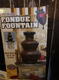 Chocolate fountain.  Big hit at parties.  Used only a couple of times.  $60