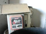 Jon took some of these pictures so I am not sure but I think that this is a solar fence charger and we actually have two of them..
