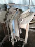 You may be able to restore this saddle so that it can be used but in any case it would be a great decorator piece for a western home or in a "man cave".