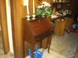 This little lady's drop front desk would be just right for that spot in your bed room or kitchen.