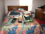 A nice double bed that we didn't have time to clear off but it will be easier to see on Wednesday.