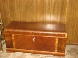 This is a very nice water fall front cedar chest.