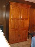 Pretty T.V. armoire.