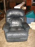 A blue La-Z-Boy recliner. This is a little more worn than the white one but it still has a lot of useful life left in it.