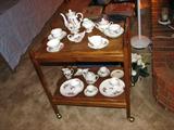 I like tea carts or tables and this one is rather unique because the trays lift off and the frame folds. Come see just how it works.