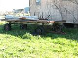 This old 4 wheel wagon needs new tires but it looks like it's in pretty good shape otherwise. (Not something Donna would say about me.) It's J.D. green and it looks kind of like the ones that they used to sell where Uncle J.D. worked.