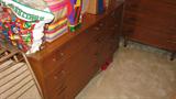 I wish I could've gotten a better photograph of the companion to the chest of drawers, but the room was small.  Nonetheless, the Mid-Century Modern mahogany dresser features an asymmetrical styling with four large drawers to the left and four smaller ones to the right.  Dad and I discussed it, and this Drexel piece could be a good sideboard-style piece, if you don't need anything for the bedroom!