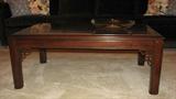 The coffee table matches a number of other mahogany Asian-inspired Drexel pieces throughout the house.