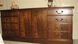 Dad and I discussed the description of this versatile piece for a while.  It has locking doors and multiple drawers, many of which also lock, for additional storage.  We came to the conclusion that it is likely to be walnut and could serve many purposes, from a credenza, to a mirrorless dresser, to a sideboard.  The best thing is that if you purchase it, you can decide its best use.