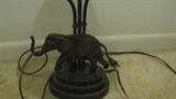 This photo shows the base of the elephant lamp up a bit closer and in finer detail.