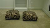 These animal print foot stools continue the exotic theme of the items available at this sale.