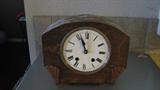The cool thing about this clock is that it has a very contemporary flair, but it could also look great with Art Deco-inspired items or with other antiques as well.