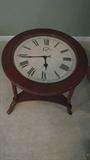 This cool clock occasional table would be a "timely" addition to your home!