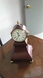 Again, this clock is modern, but it is a lovely reproduction of a traditional Empire style.