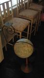 This photo shows both a handsome globe on its own stand as well as another view of the bar stools.