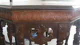 This photo shows a close-up of the beautiful carving on the end table pictured previously.
