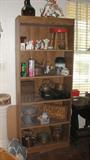 This shelf has some of the glass and china and other items that we have.