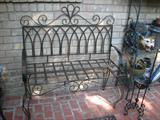 This iron patio bench is beautiful and versatile.