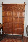 Massive carved and framed cabinet in Mexian cedar.  It has shelves in it and measures about 77x49x19.  The household inventory lists it as from Mexico and c.1934.  It appears to me that they must have gotten a number of furniture items from Mexico at that time because this circa date keeps croping up.