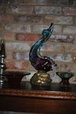 This art glass dolphin (Jon says it doesn't look like a dolphin to him but you know how we antique dealers are in what we say) has controlled bubbles in the base and lovely colors in it.  It is 16" high and is from Italy.  The other two pieces in the photo are believed to be Itanian also.
