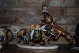 Pottery sculpture of Don Quixote and Sancho Panza by Cacciapuoti in polychrome glazes.  It is modern, from Italy and has some slight damage to the hand of one of the figures.