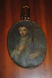 Here is the other piece that I like.  Oval oil painting on copper of an un-named male saint with a large standing crucifix resting on his sholder.  Inscribed on the back is "POR PAN FITO DIAS/ANO DE 1678".  The 6 3/8 inch tall oval is mounted in a gilt-bronze frame with a large eyelet for hanging. Spanish Colonial (Mixico) c. 1678.