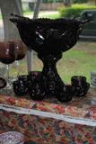I thought I could get the color in the picture but it didn't work so you will have to come to see the deep purple (name for a song?) of this punch bowl.  It is not marked but is very nice.  It is on a stand as you can see so it would make a great tall center piece or you could take it off the stand for a shorter one.  There are 7 cups.  This we will sell as a set.