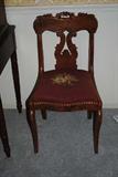 Victorian furniture is a favorite of Donna and me.  This is a very nice walnut side chair with a pierced splat and crest rail.  It has sabre legs and needle point seat.