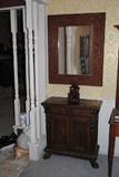 Rectangular wall looking glass or mirror in a broad Mexican cedar carved frame.  it is 21x37 Mexico c.1934.  see the next picture for a better view of the credenza.