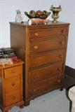 This is a good chest of drawers.  It has 5 drawers and measures 34x18x49.
