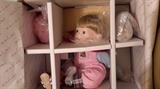 BABY CONDUCTOR DOLL