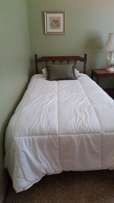 One of a pair of twin beds