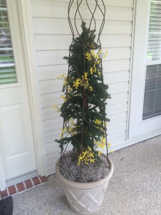 One of two matching topiary form and pot