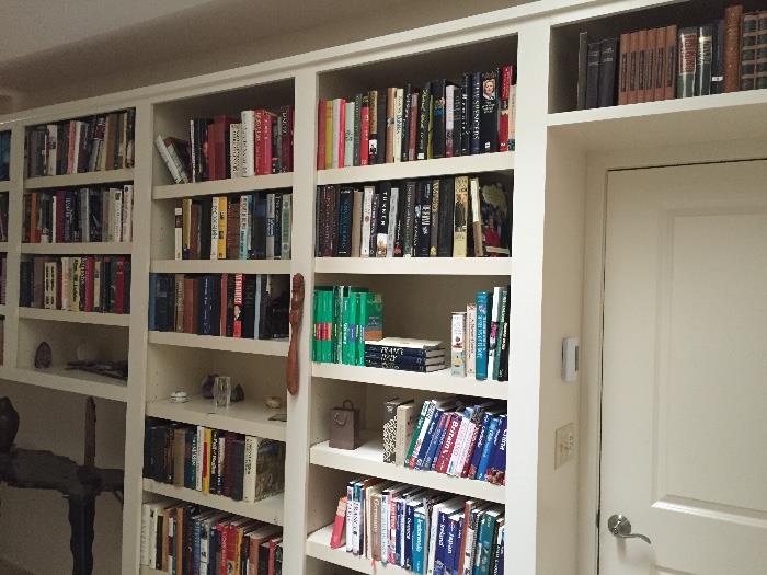 Tons of books of various genres (Shelves are built in and ARE NOT for sale)