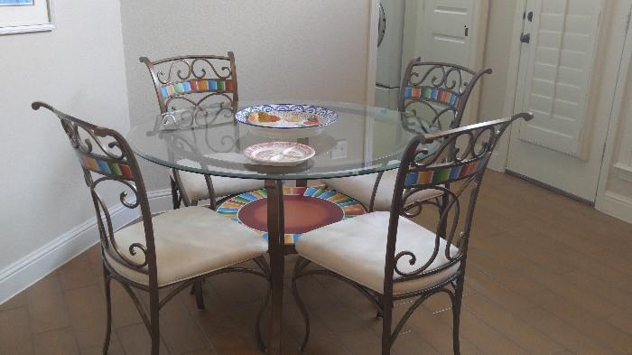 round glass top dining table wrought iron